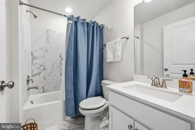 a balcony with furniture and wooden floor