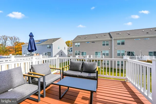 a view of a garage with a bike and white walls
