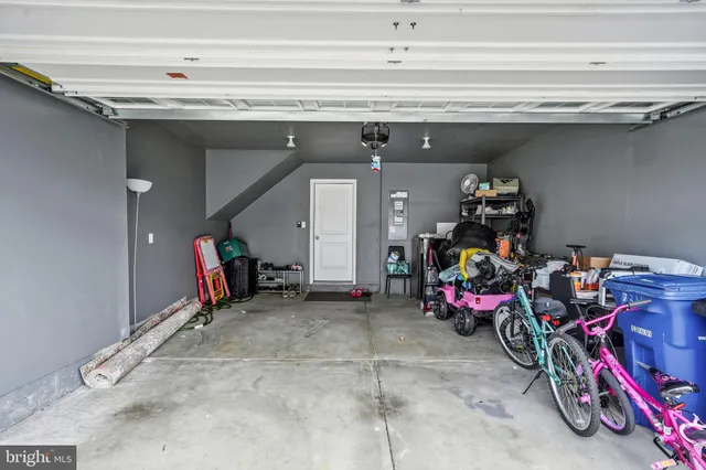 a backyard of a house with outdoor seating