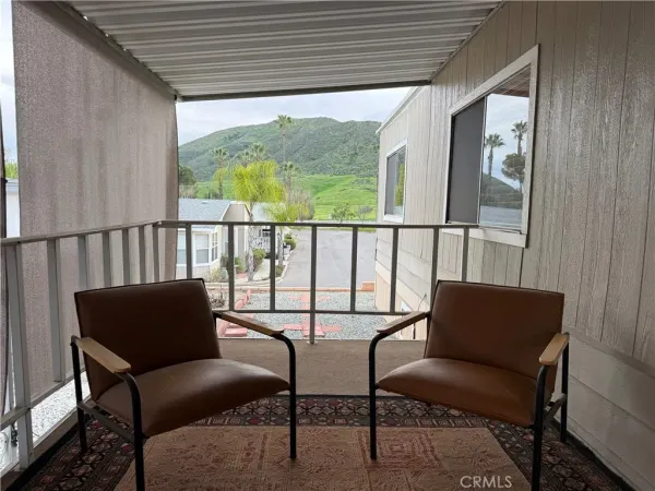 a balcony view with a couch