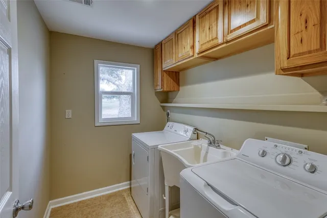 a bathroom with a sink toilet and vanity