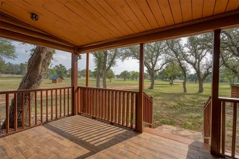 a backyard of a house with lots of green space