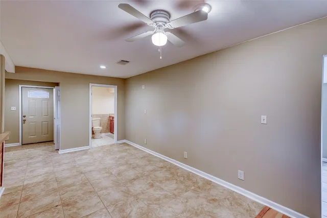 a view of a kitchen counter top space cabinets and stainless steel appliances