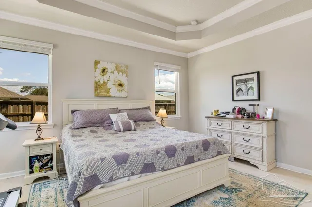 a bedroom with a bed and a cabinets
