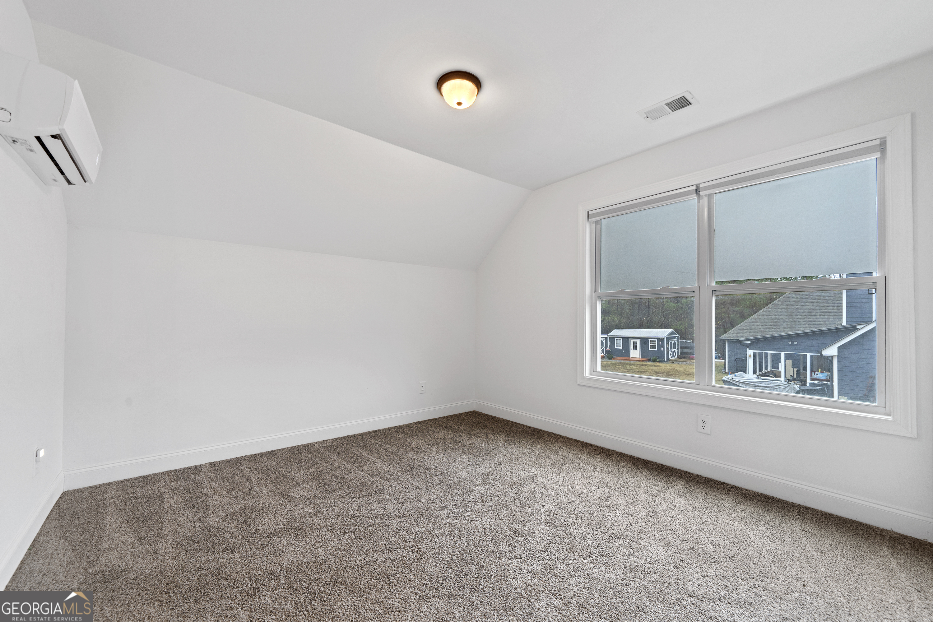 149 Willow Forest Road Milledgeville, GA 31061 - Photo 32 of 52 a view of an empty room with a window
