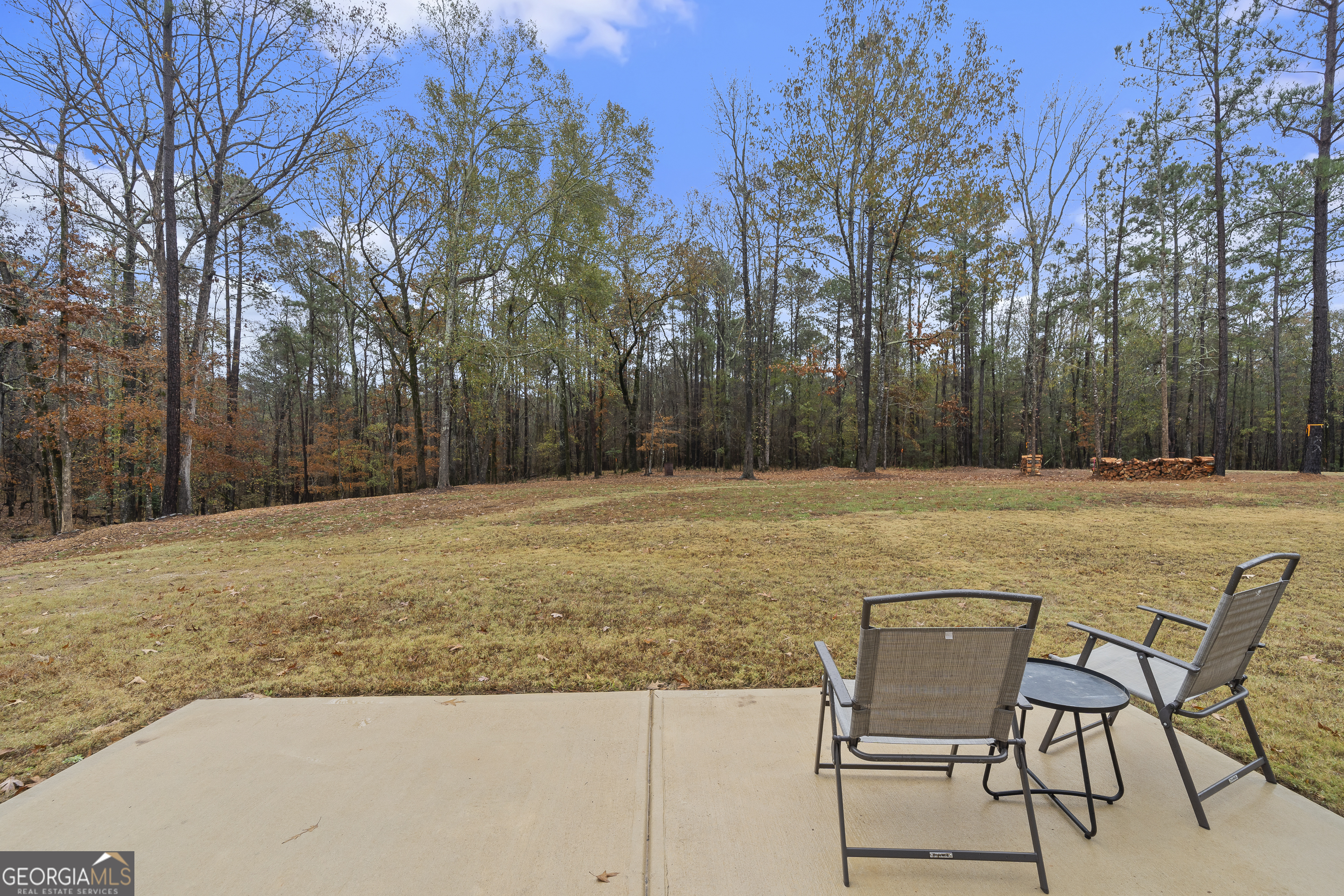 149 Willow Forest Road Milledgeville, GA 31061 - Photo 49 of 52 a swimming pool with outdoor seating and trees