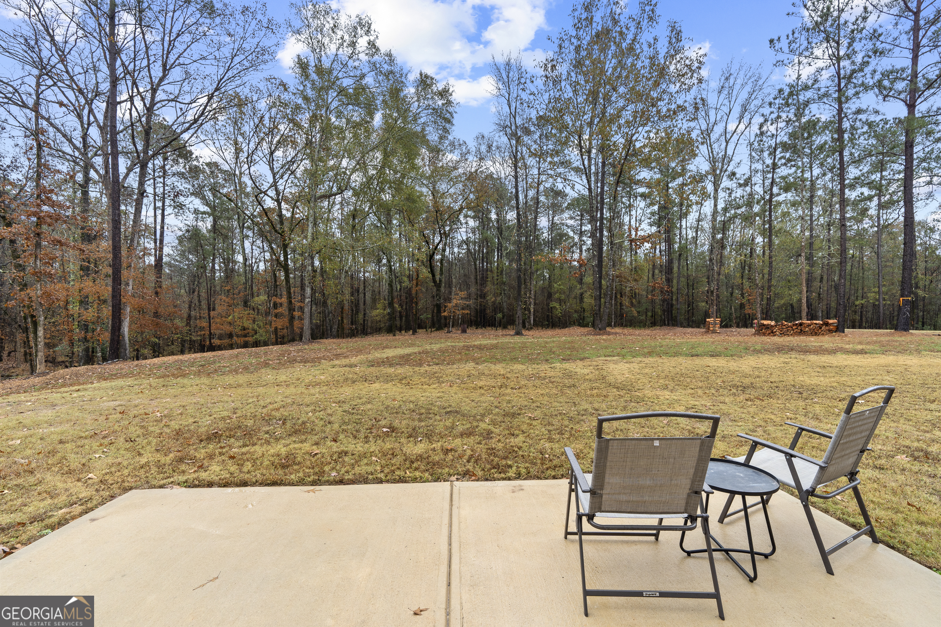 149 Willow Forest Road Milledgeville, GA 31061 - Photo 51 of 52 a swimming pool with outdoor seating and trees