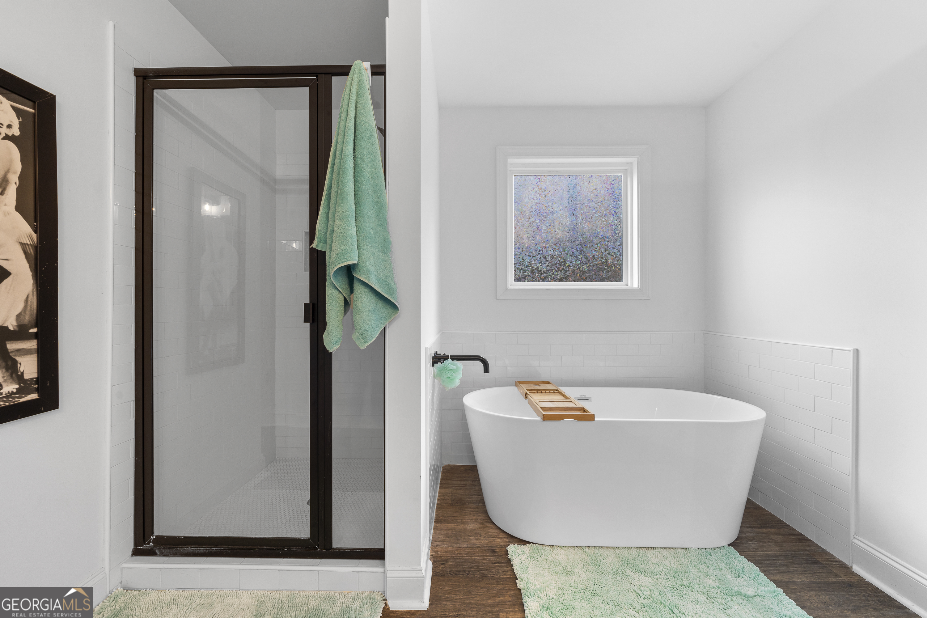 149 Willow Forest Road Milledgeville, GA 31061 - Photo 8 of 52 a white bath tub sitting in a bathroom