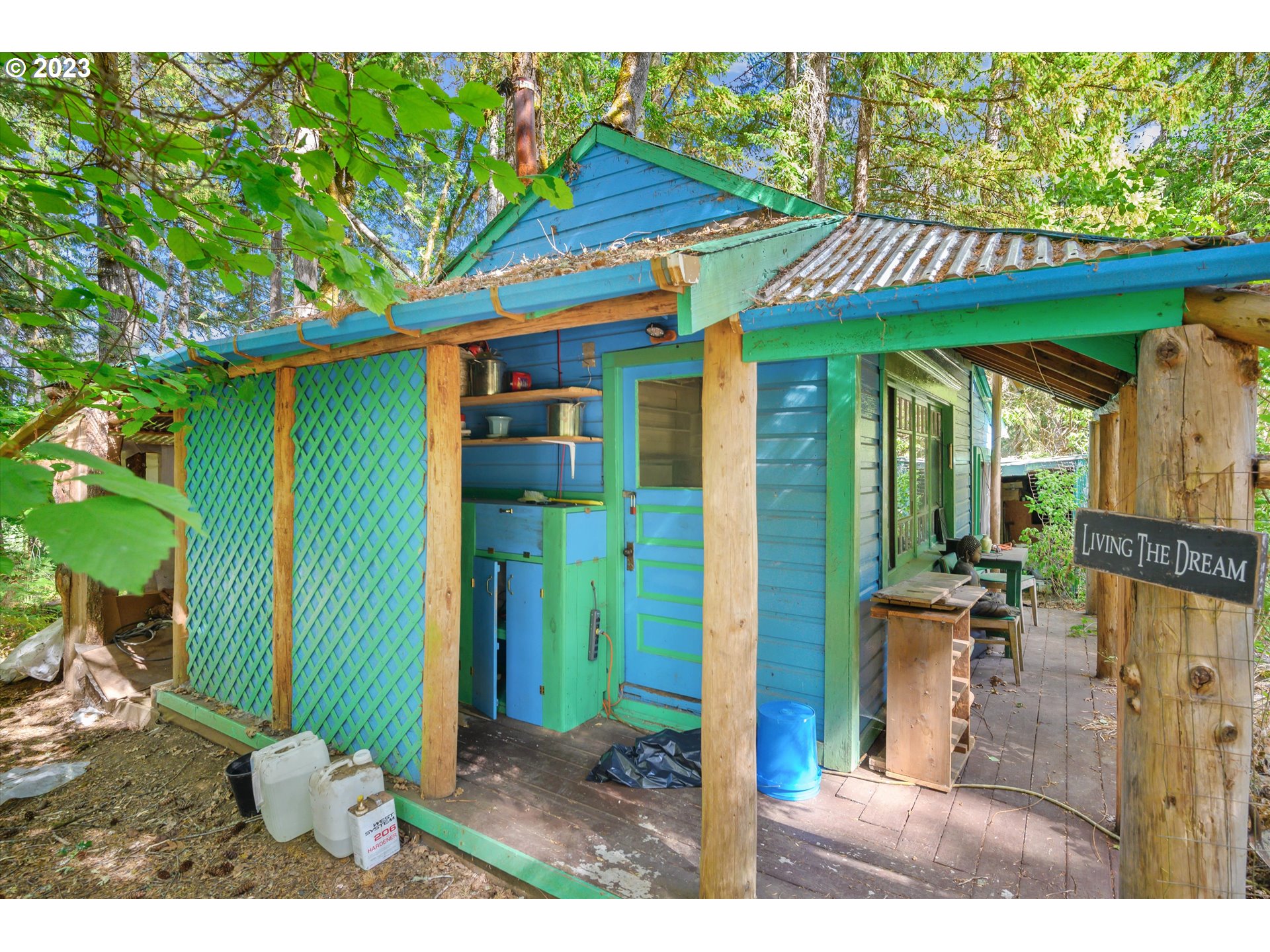 27801 Thomson Mill Road Sheridan, OR 97378 - Photo 6 of 9 a view of a patio with a table and chairs