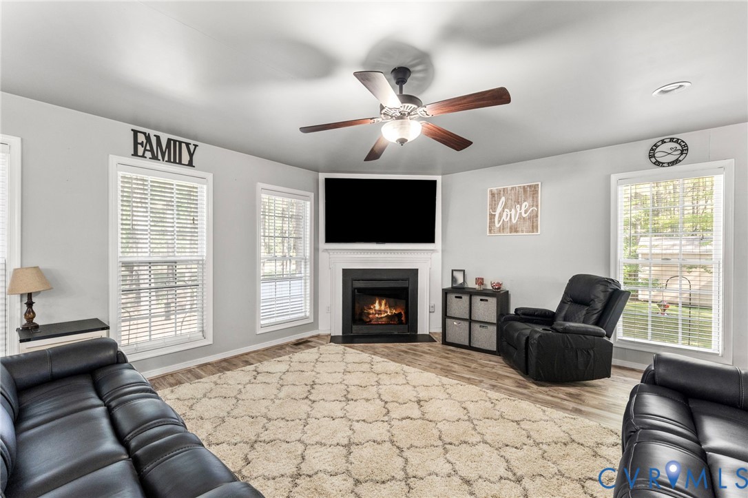 3120 Denise Road Petersburg, VA 23805 - Photo 26 of 51 Spacious living area featuring a corner-mounted fi