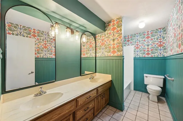 $438,500 | 1712 Woodcreek Drive, Richardson, TX 75082