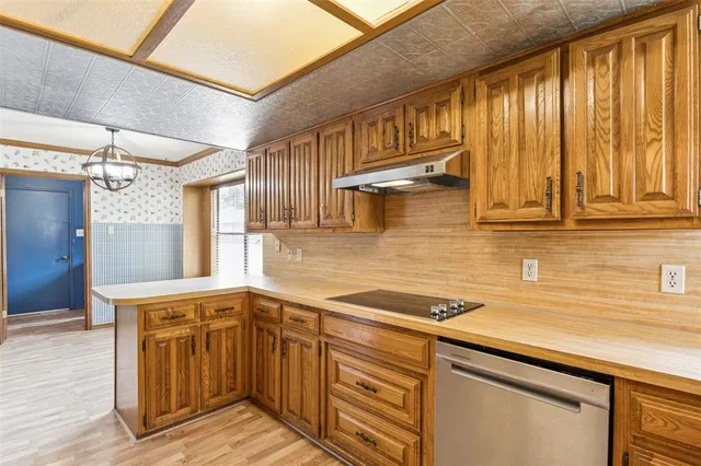 $438,500 | 1712 Woodcreek Drive, Richardson, TX 75082