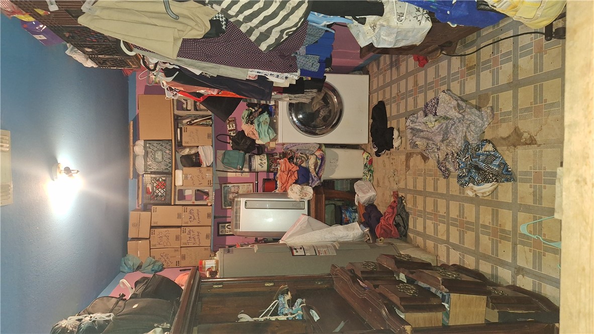 3571 Winding Road Hearne, TX 77859 - Photo 11 of 14 a view of a room with workspace and toys