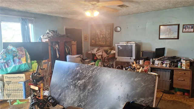 a patio with a table and chairs