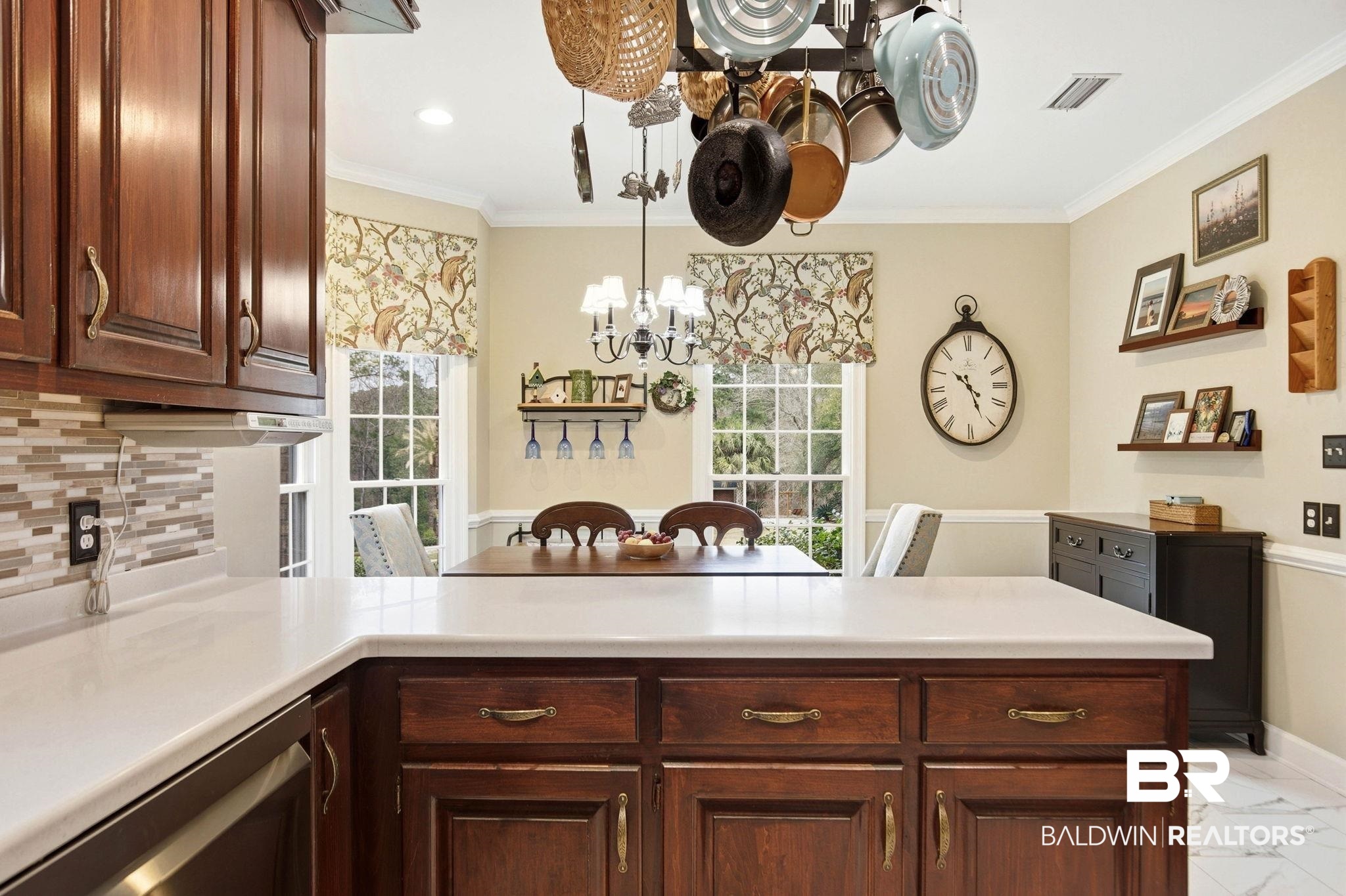 31515 Rhett Drive Spanish Fort, AL 36527 - Photo 19 of 100 This beautiful kitchen has plenty of prep space, corian countertops, a gas cooktop and stainless steel appliances. (Fridge and DW are brand new). The prep space measures 12' x 10' 6" and the eating area has a bay window and measures 13' 6" x 11' 8".