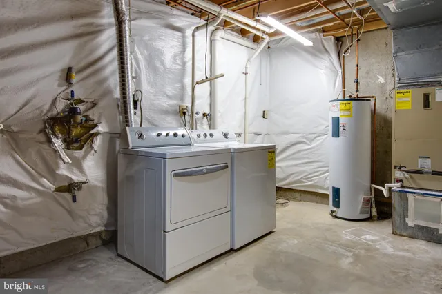 a utility room with cabinets