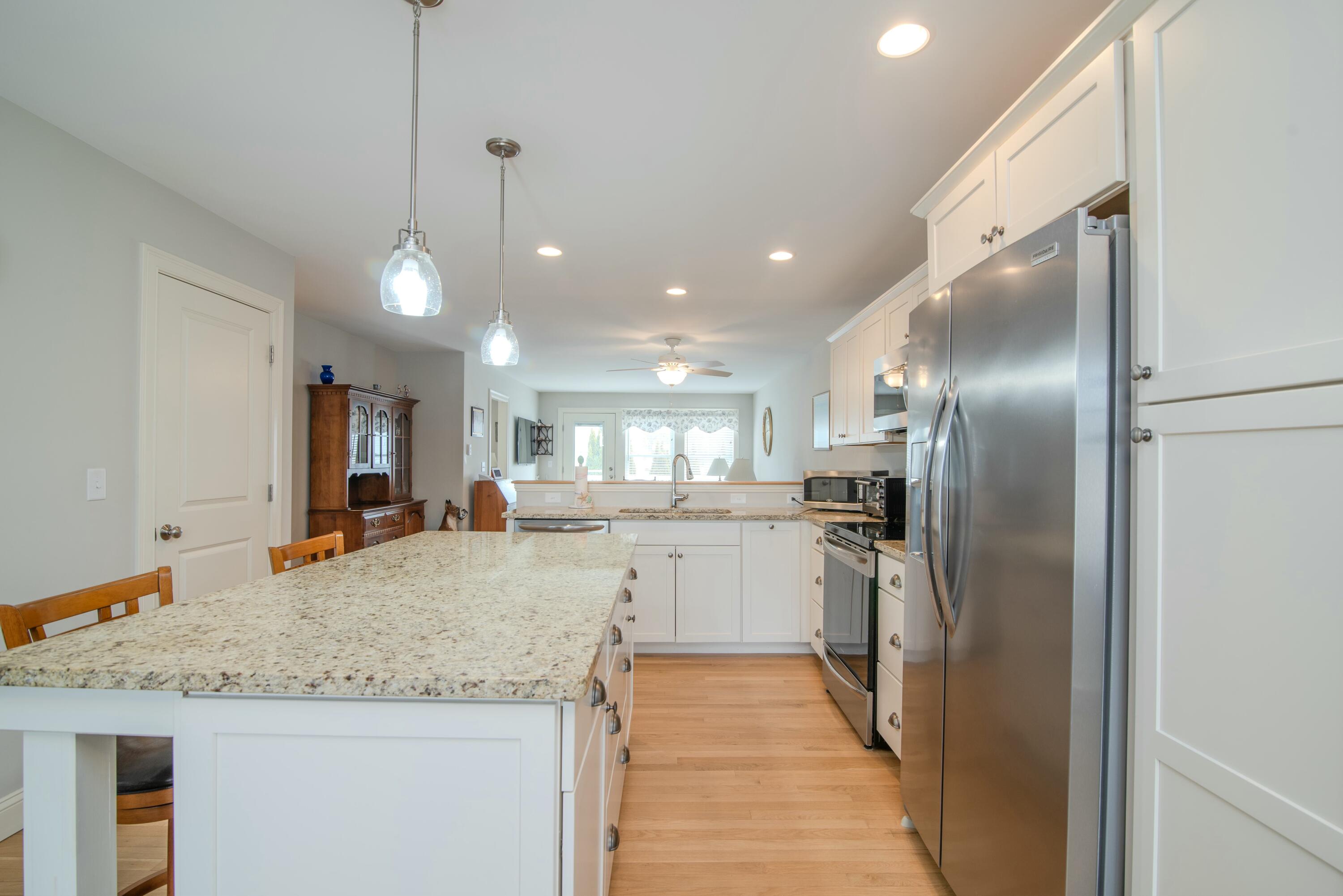 2 Levi Lane, Unit 103 Biddeford, ME 04005 - Photo 8 of 38 Kitchen into LR