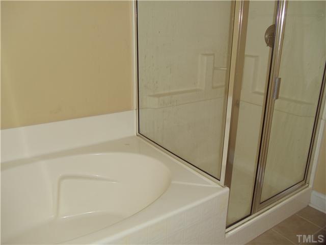 3811 Lunceston Way, Unit 305 Raleigh, NC 27613 - Photo 14 of 25 master bath (b) with garden tub.