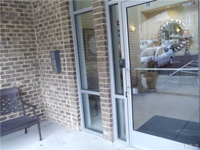 3811 Lunceston Way, Unit 305 Raleigh, NC 27613 - Photo 2 of 25 Secure coded entry system, keyless fob included.