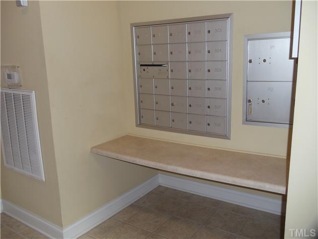 3811 Lunceston Way, Unit 305 Raleigh, NC 27613 - Photo 23 of 25 Secure mail storage right in the lobby!