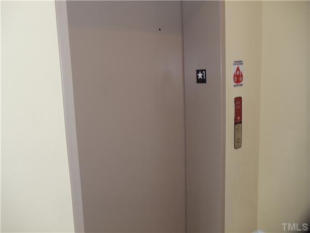 3811 Lunceston Way, Unit 305 Raleigh, NC 27613 - Photo 5 of 25 Elevator to 3rd floor Penthouse suite!