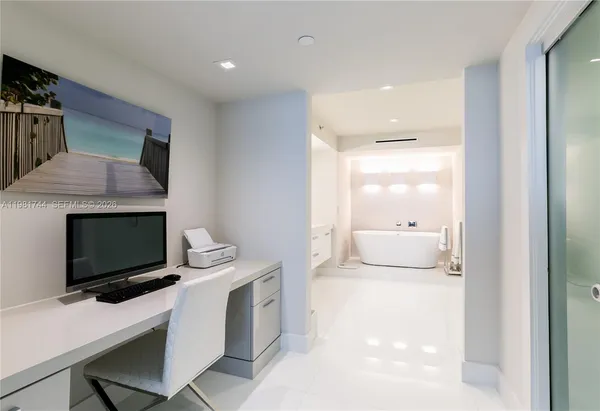 a living room with a fireplace and a table