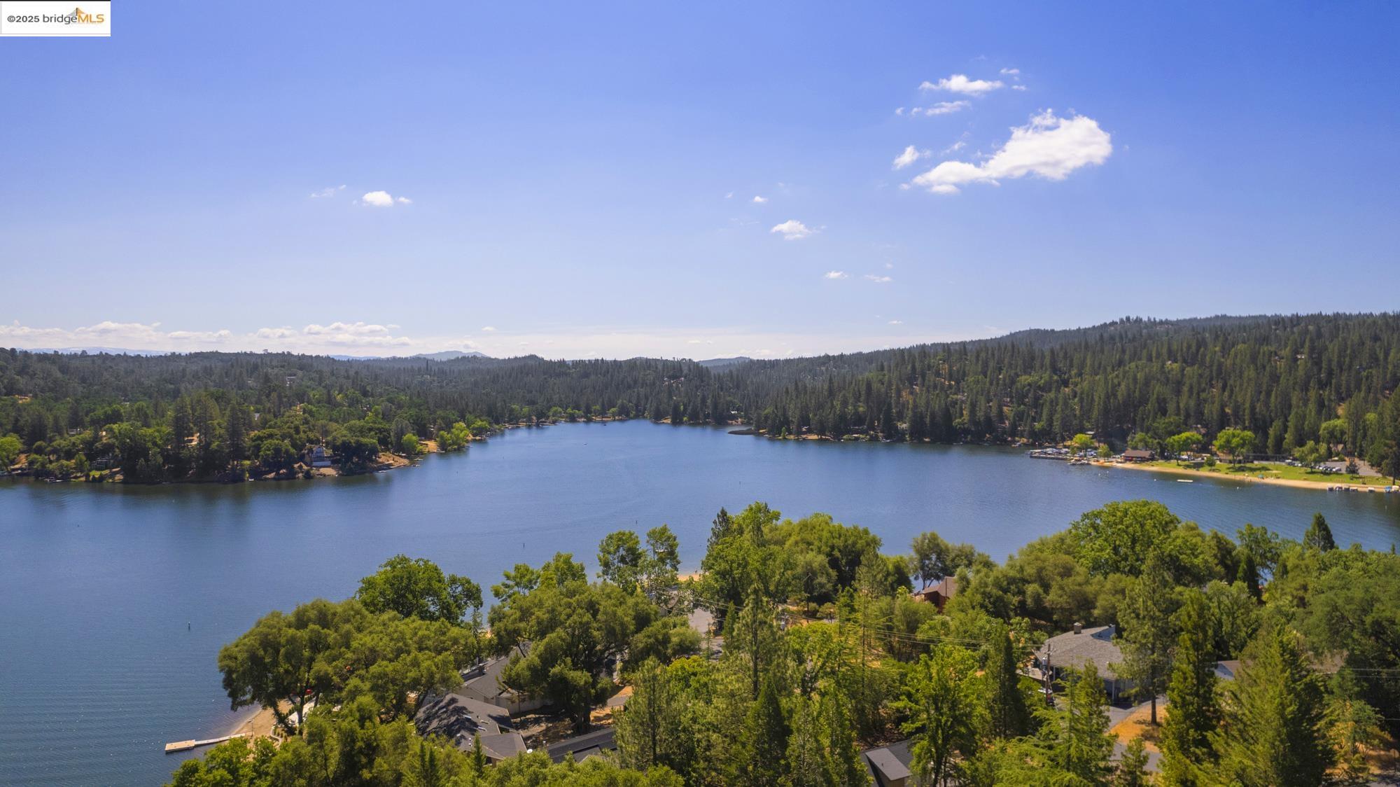 2-305 Ferretti Road Groveland, CA 95321 - Photo 18 of 25 Water view featuring a heavily wooded area