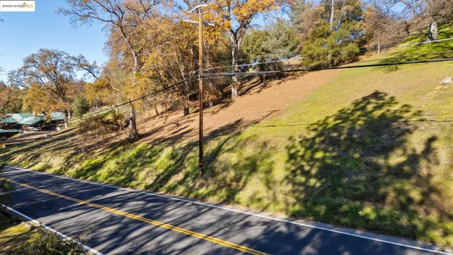 a view of swimming pool from a yard