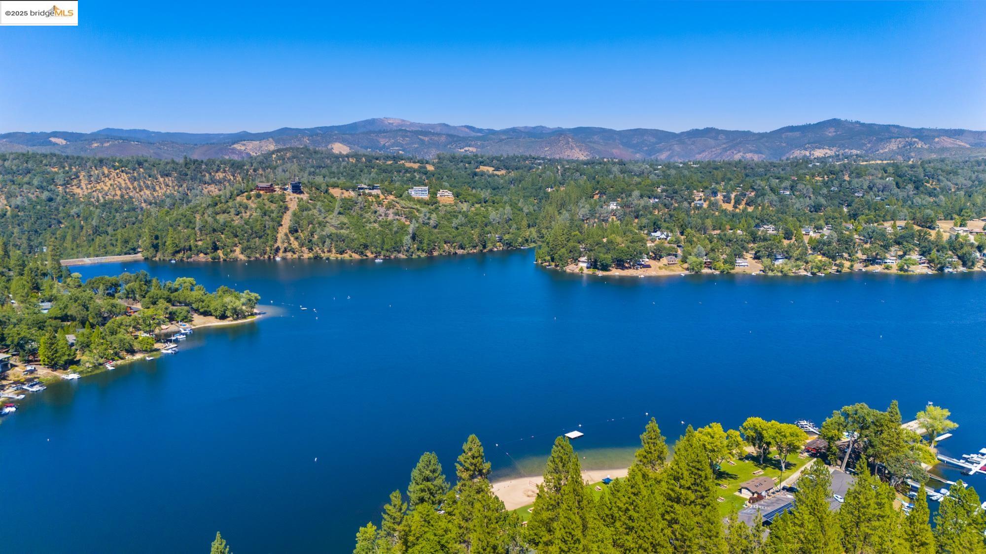 2-305 Ferretti Road Groveland, CA 95321 - Photo 5 of 25 Aerial view of a water and mountain view