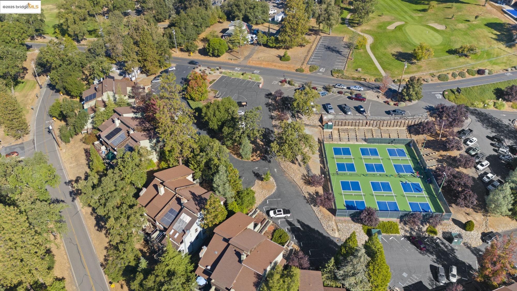 2-305 Ferretti Road Groveland, CA 95321 - Photo 8 of 25 Aerial view of property and surrounding area featuring a golf course