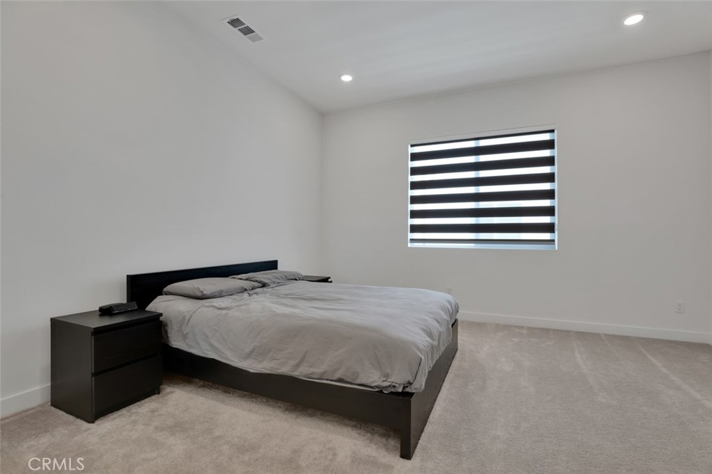 145 Sash Irvine, CA 92618 - Photo 11 of 20 a bedroom with a bed and a window