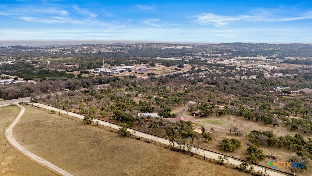 2795 Highway 290 Dripping Springs, TX 78620 - Photo 40 of 40 an aerial view of residential houses with city view
