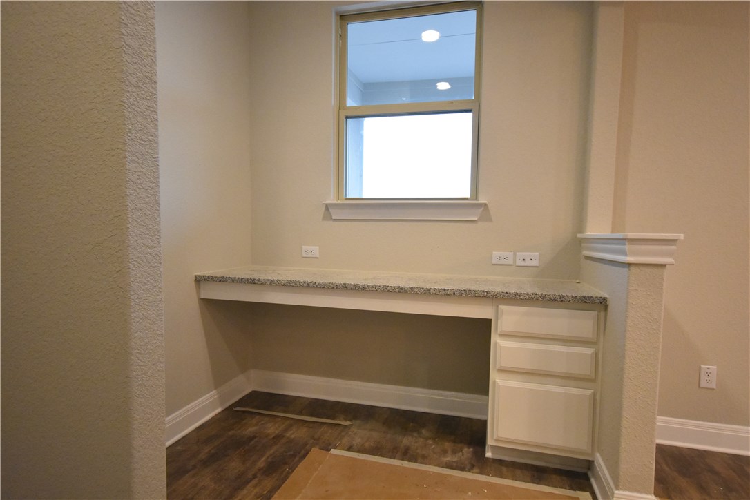 15911 Cessida Street Austin, TX 78728 - Photo 9 of 22 Kitchen Desk Upon Entering From Garage.