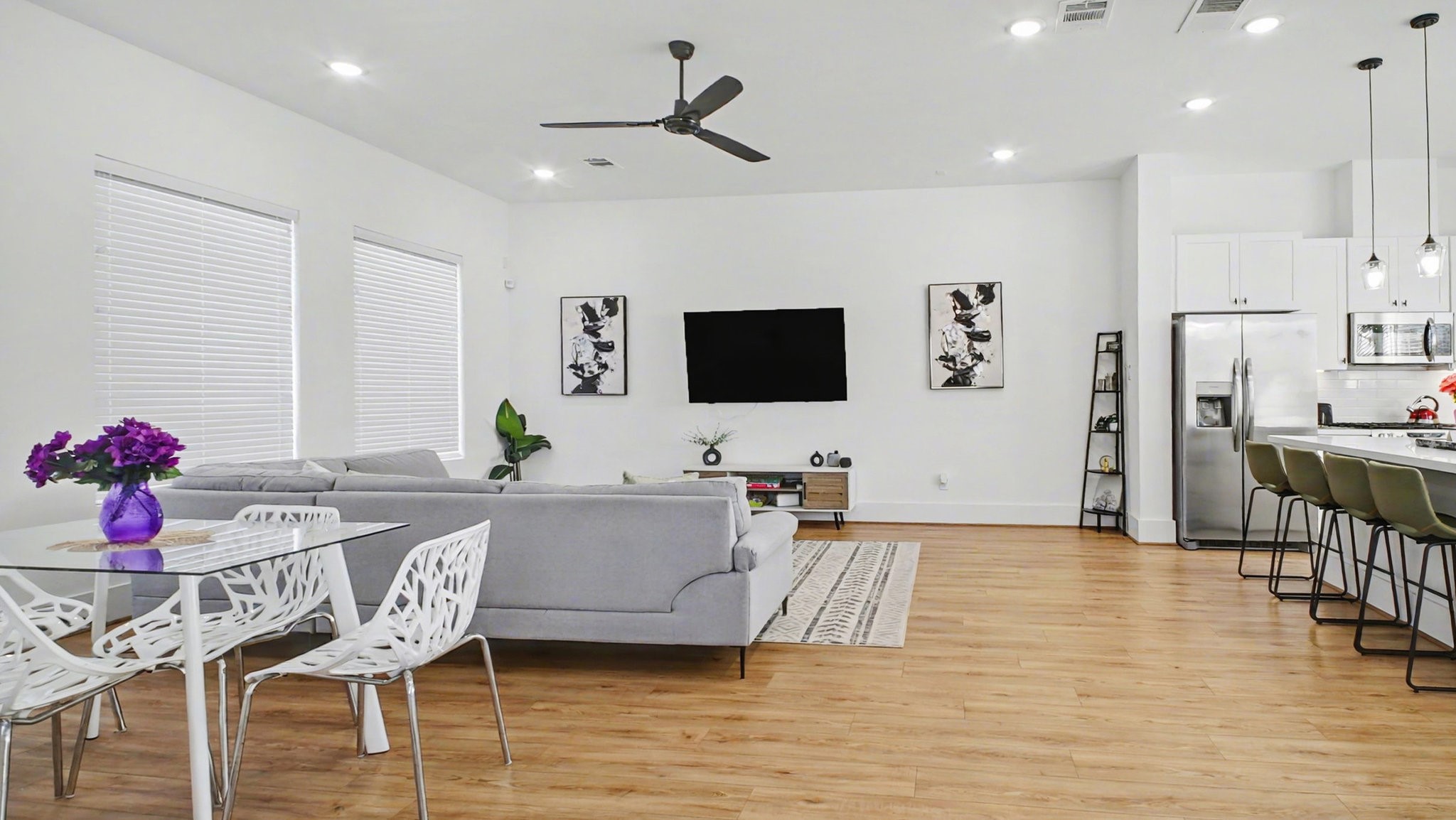 2802 Tierwester Street Houston, TX 77004 - Photo 13 of 35 a living room with furniture and a flat screen tv