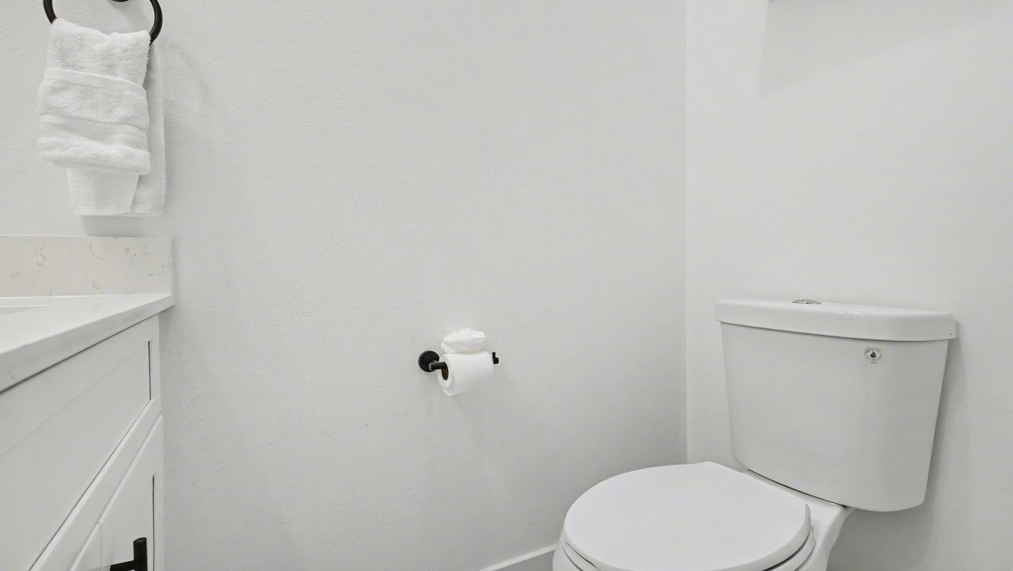 2802 Tierwester Street Houston, TX 77004 - Photo 19 of 35 a white toilet sitting next to a white sink