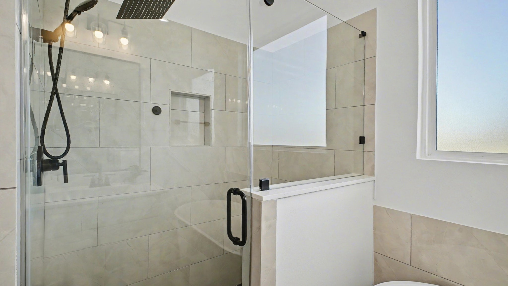 2802 Tierwester Street Houston, TX 77004 - Photo 25 of 35 a bathroom with a shower