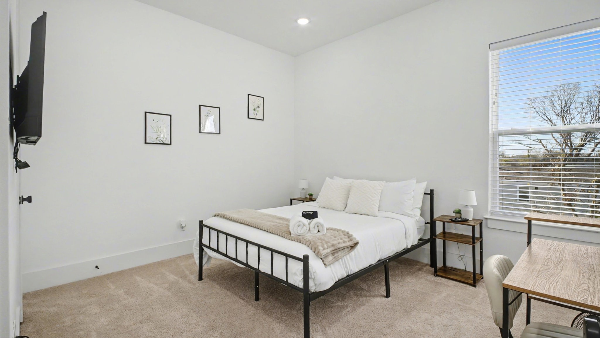 2802 Tierwester Street Houston, TX 77004 - Photo 27 of 35 a bed room with a bed and a window