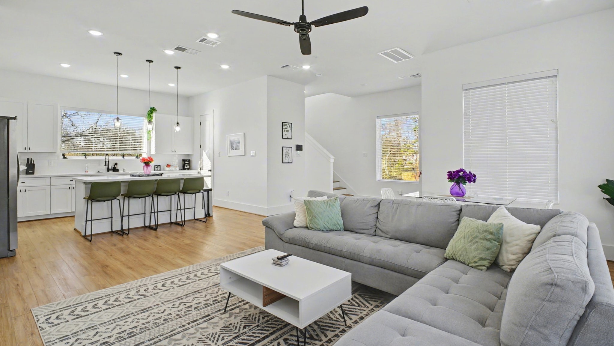 2802 Tierwester Street Houston, TX 77004 - Photo 10 of 35 a living room with furniture and a large window