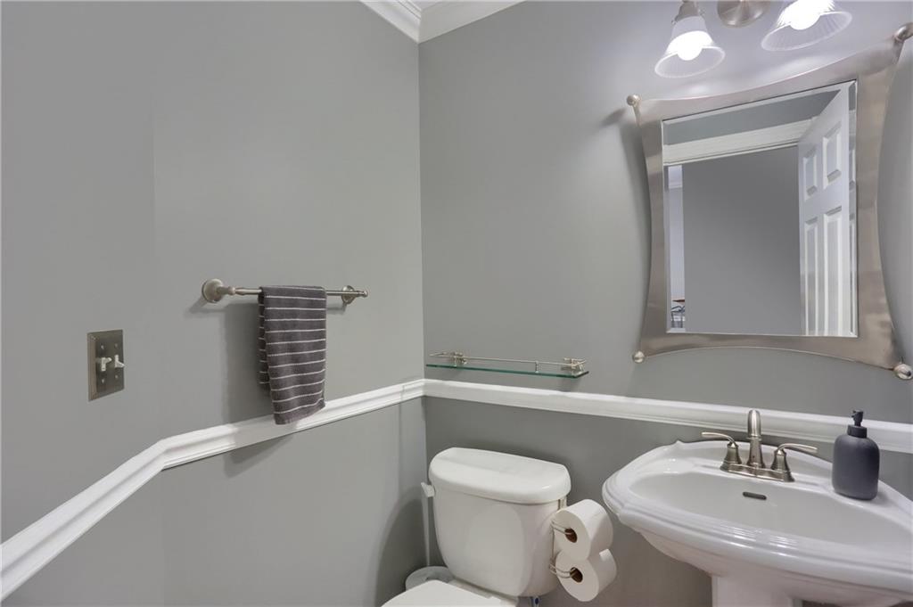 201 Beech Street Gibsonia, PA 15044 - Photo 21 of 49 a bathroom with a toilet sink and mirror