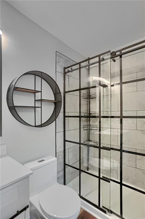 201 Beech Street Gibsonia, PA 15044 - Photo 30 of 49 a bathroom with a toilet a sink and a mirror