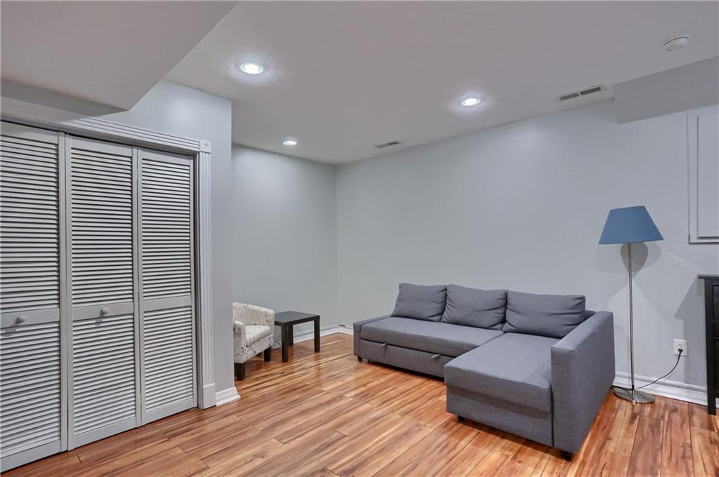 201 Beech Street Gibsonia, PA 15044 - Photo 40 of 49 a living room with furniture and a wooden floor