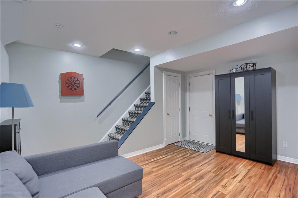 201 Beech Street Gibsonia, PA 15044 - Photo 41 of 49 a living room with furniture and a ceiling fan