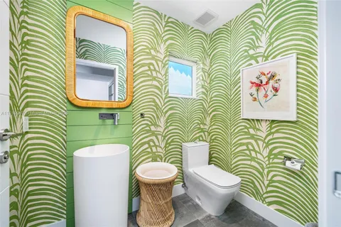 a view of a patio with swimming pool