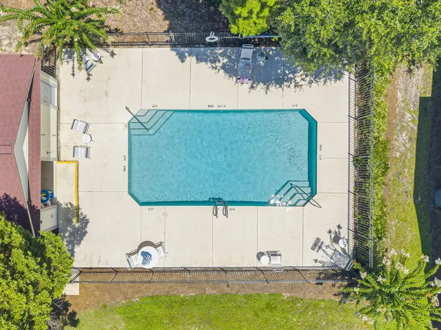 an aerial view of a house having yard