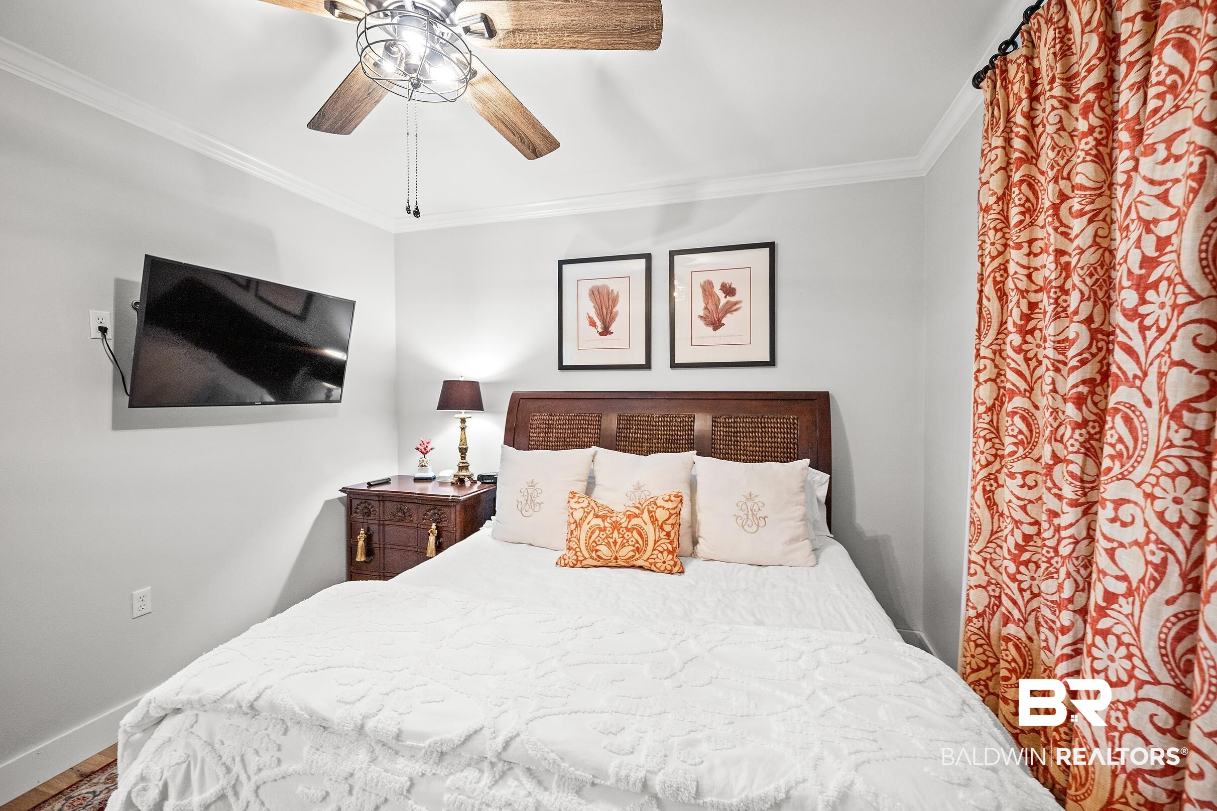 8490 Bay View Drive Foley, AL 36535 - Photo 56 of 67 Bedroom featuring ornamental molding and a ceiling fan