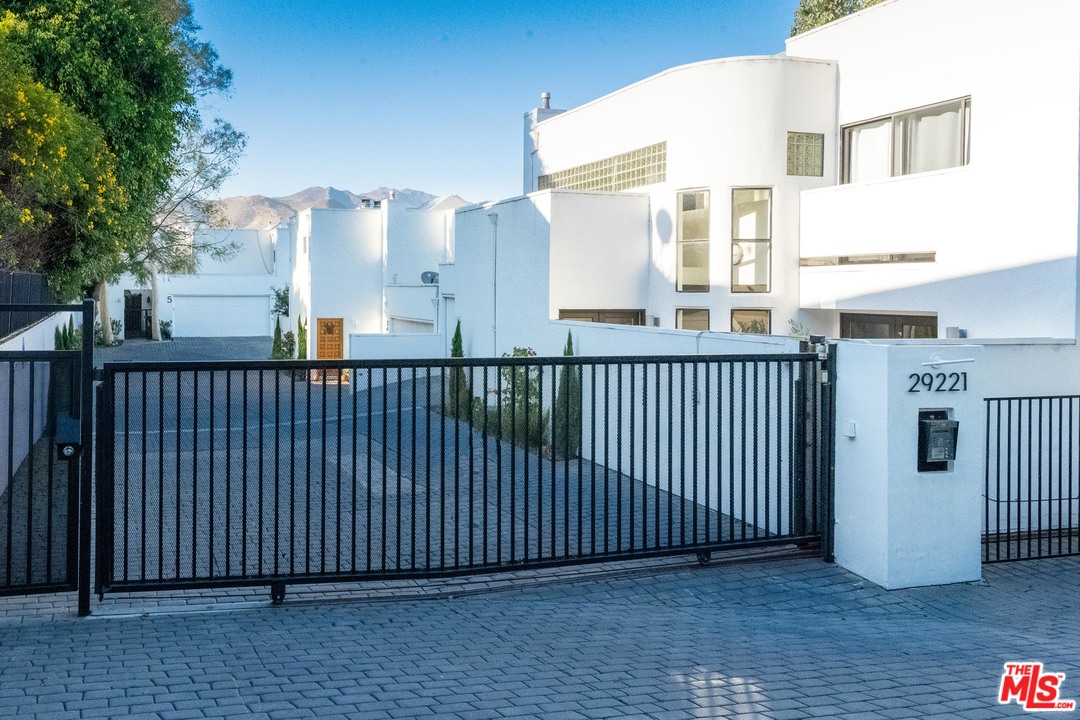 29221 Heathercliff Road, Unit 8 Malibu, CA 90265 - Photo 1 of 3 a view of a building from a balcony