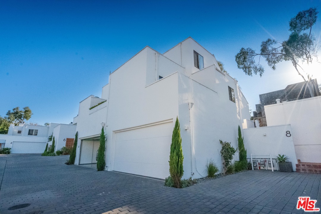 29221 Heathercliff Road, Unit 8 Malibu, CA 90265 - Photo 3 of 3 a view of a house with a garage