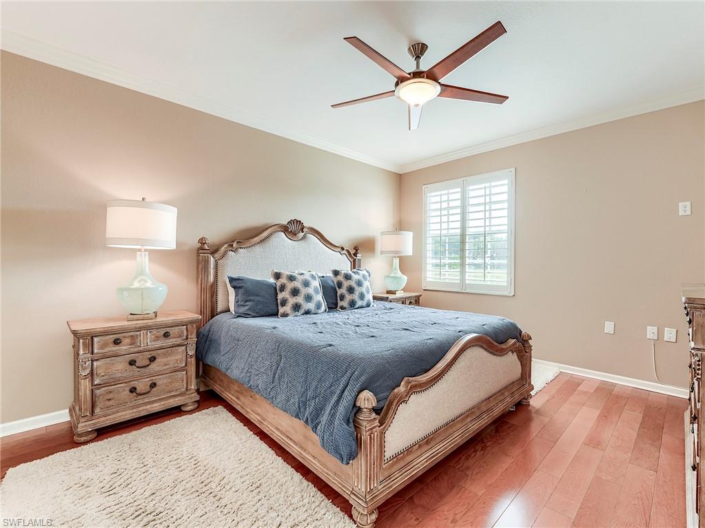 22921 Rosedale Drive, Unit 102 Estero, FL 34135 - Photo 21 of 33 a large bedroom with bed and window
