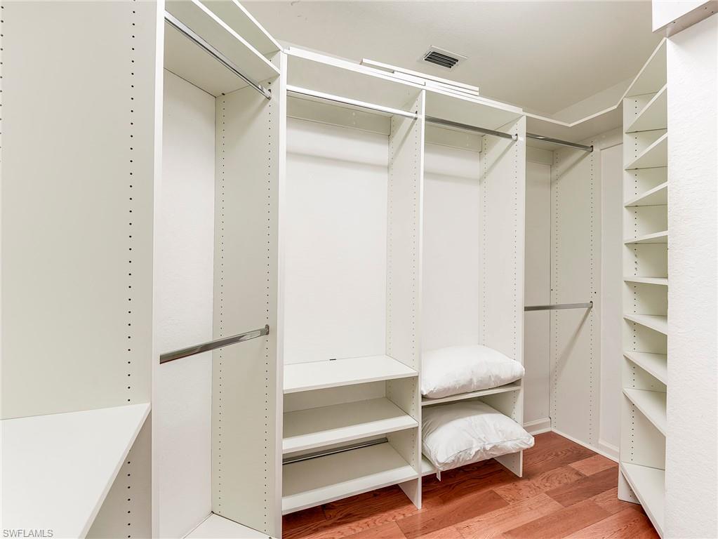 22921 Rosedale Drive, Unit 102 Estero, FL 34135 - Photo 24 of 33 a bathroom with a toilet and a shower