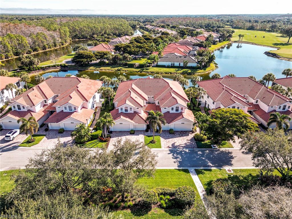 22921 Rosedale Drive, Unit 102 Estero, FL 34135 - Photo 31 of 33 an aerial view of residential houses with outdoor space